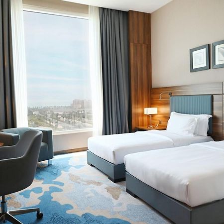 베이 라 선 호텔 앤 마리나 King Abdullah Economic City 외부 사진 A room at the hotel