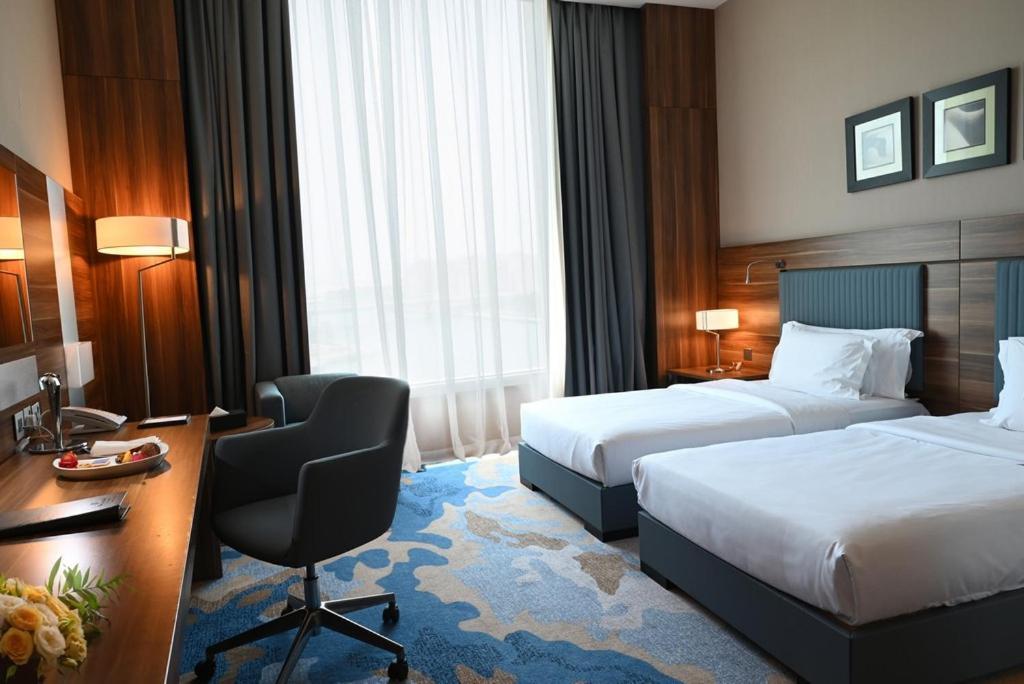 베이 라 선 호텔 앤 마리나 King Abdullah Economic City 외부 사진 A room at the hotel